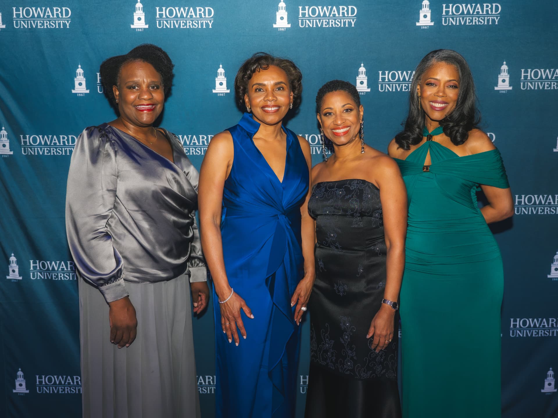 Guests posing together at the Charter Day Dinner
